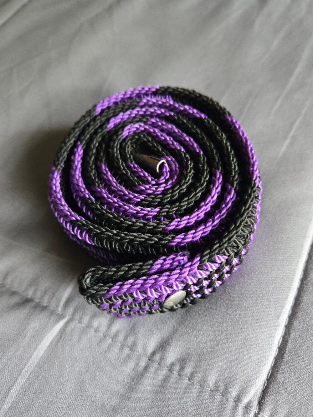 Purple and black braided belt